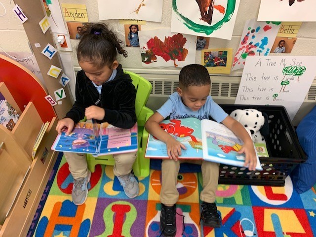 During centers students can go to the library and read their favorite book. Prek-3 loves reading!